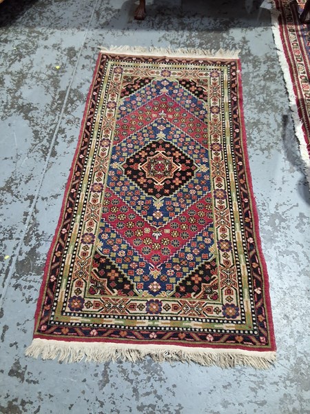 Lot 125 - PERSIAN RUG