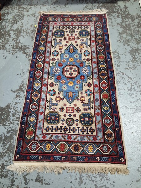 Lot 26 - PERSIAN RUG