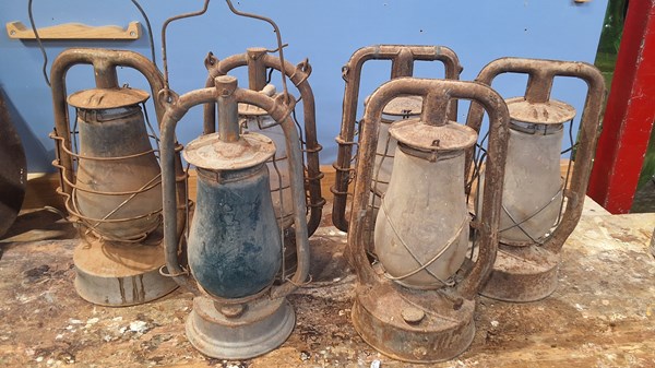 Lot 214 - HURRICANE LAMPS