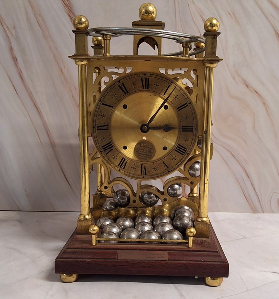 Lot 1399 - SPHERICAL WEIGHT CLOCK