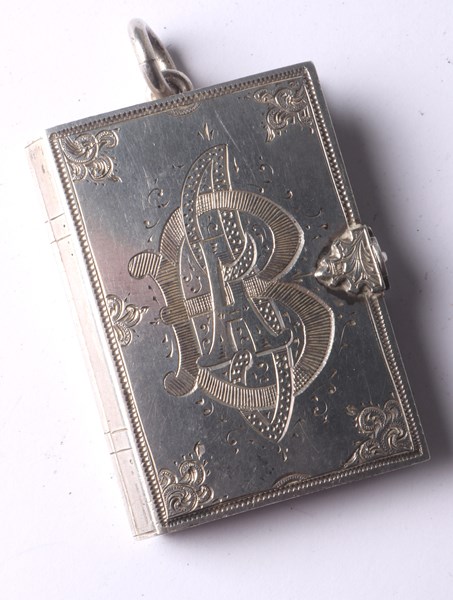 Lot 1066 - SILVER BOOK HOLDER