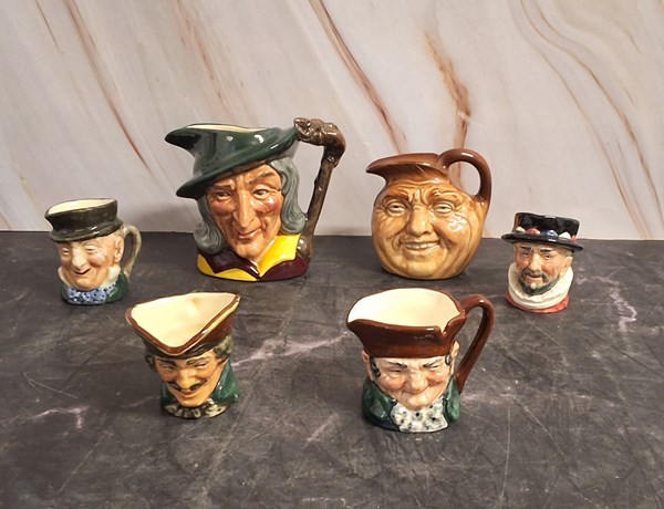 Lot 1122 - CHARACTER JUGS