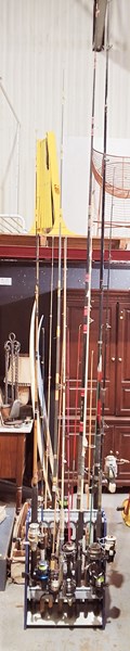Lot 257 - FISHING RODS IN STAND