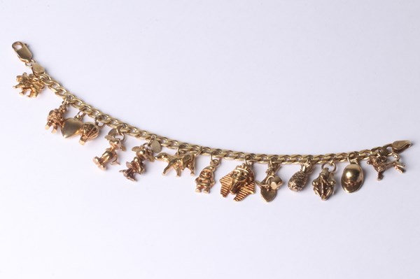Lot 1007 - GOLD CHARM BRACELET