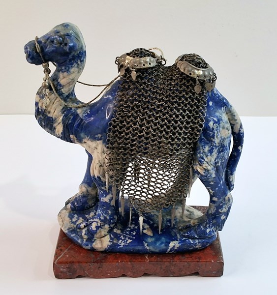 Lot 1047 - CAMEL ORNAMENT