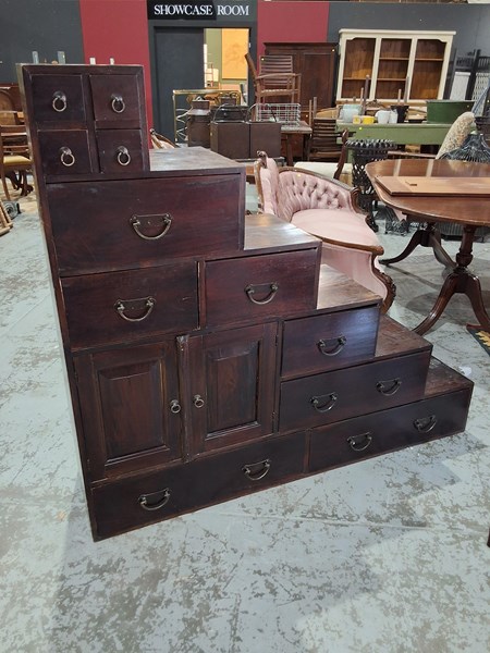 Lot 82 - STEPPED CABINET