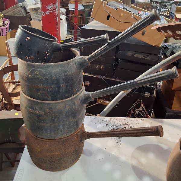 Lot 435 - CAST IRON POTS