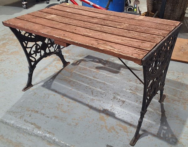 Lot 249 - GARDEN TABLE