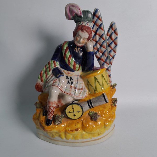 Lot 1267 - STAFFORDSHIRE FIGURE