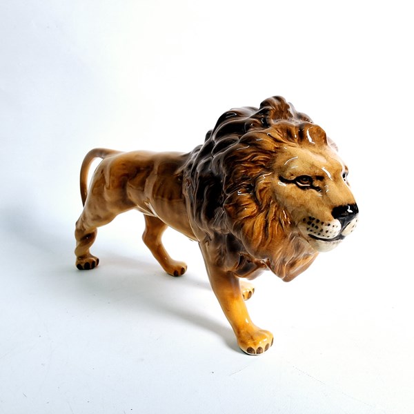 Lot 1249 - BESWICK LION