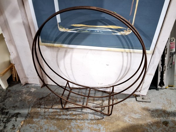 Lot 391 - FIREWOOD HOLDER