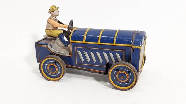 Lot 79 - WIND UP Tractor