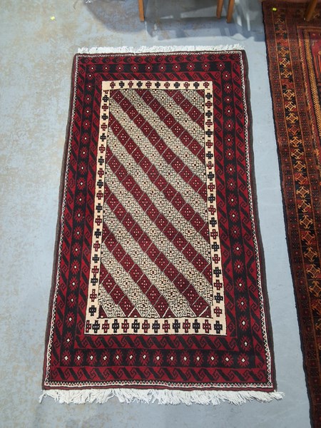 Lot 176 - PERSIAN RUG