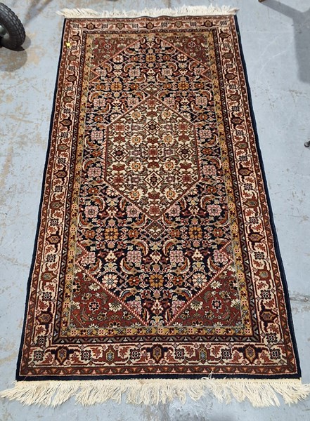 Lot 212 - PERSIAN RUG