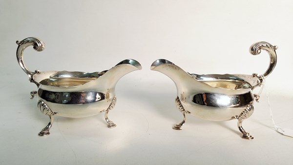 Lot 1064 - SILVER JUGS