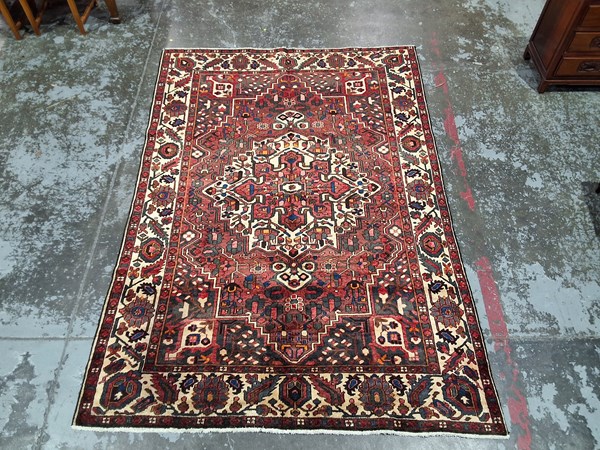 Lot 25 - PERSIAN RUG