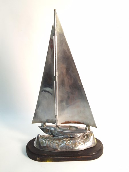 Lot 1451 - CHROMED SAILBOAT ORNAMENT