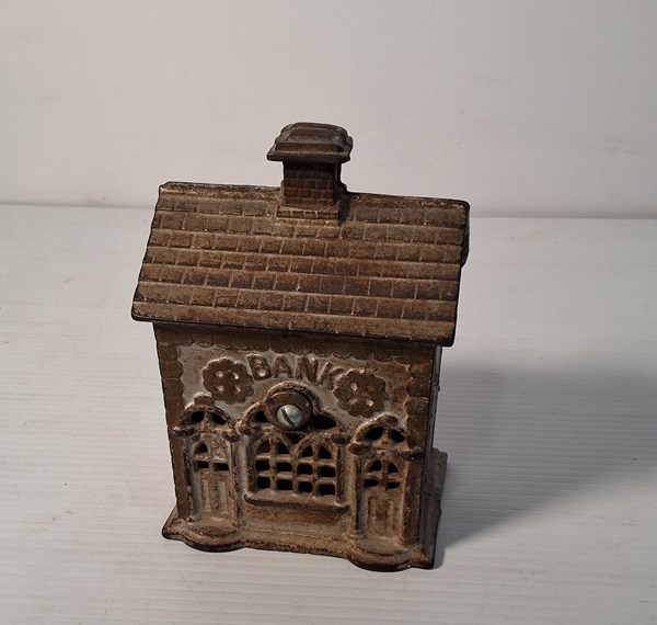 Lot 1209 - VINTAGE MONEY BANK