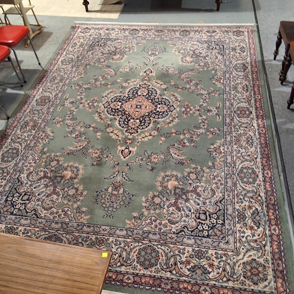 Lot 218 - MACHINE MADE RUG