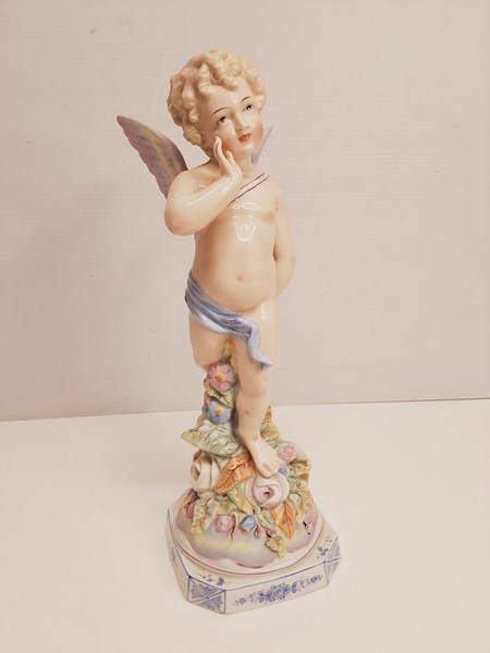 Lot 1348 - CUPID FIGURINE