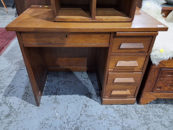 Lot 156 - Oak five drawer desk with pull out desk...