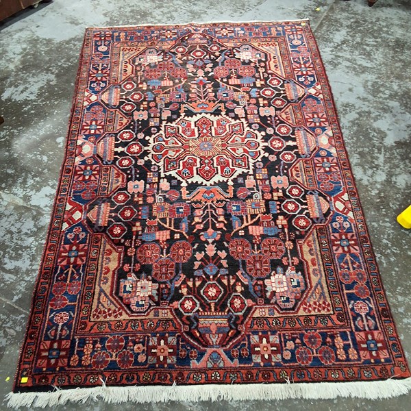 Lot 204 - PERSIAN RUG