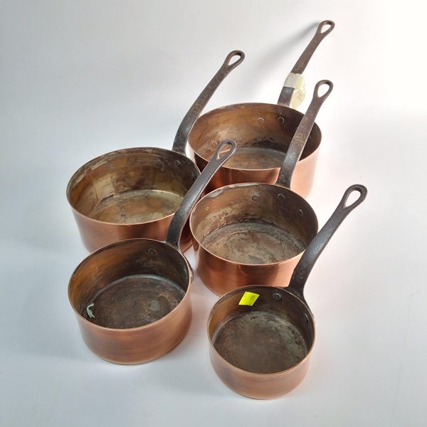 Lot 1332 - GRADUATED COPPER SAUCEPANS