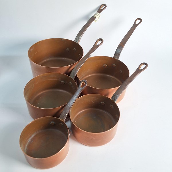 Lot 1221 - GRADUATED COPPER SAUCEPANS