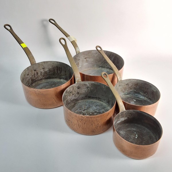 Lot 1414 - GRADUATED COPPER SAUCEPANS