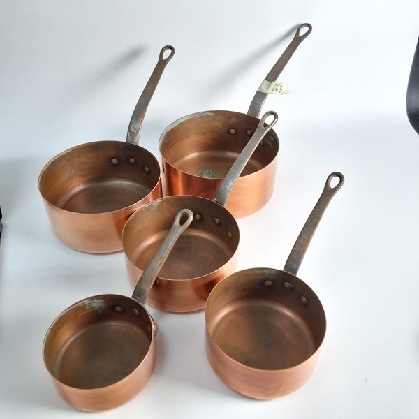 Lot 1248 - GRADUATED COPPER SAUCEPANS