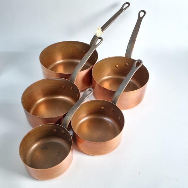 Lot 1309 - GRADUATED COPPER SAUCEPANS