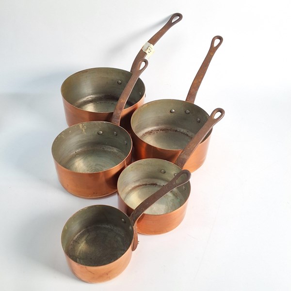 Lot 1383 - GRADUATED COPPER SAUCEPANS