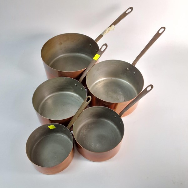 Lot 1443 - GRADUATED COPPER SAUCEPANS