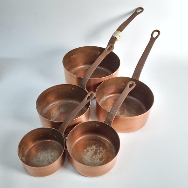 Lot 1350 - GRADUATED COPPER SAUCEPANS