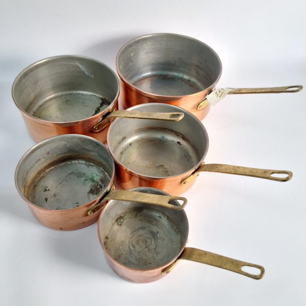 Lot 1419 - GRADUATED COPPER SAUCEPANS