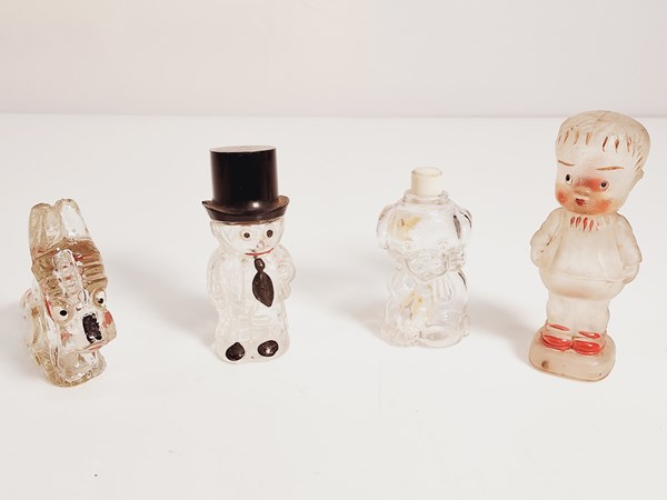 Lot 1082 - NOVELTY PERFUME BOTTLES (4)