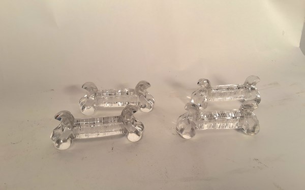 Lot 1243 - BACCARAT KNIFE RESTS