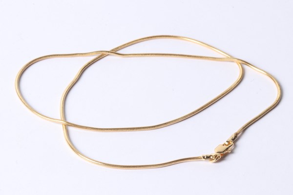 Lot 1038 - GOLD NECKLACE