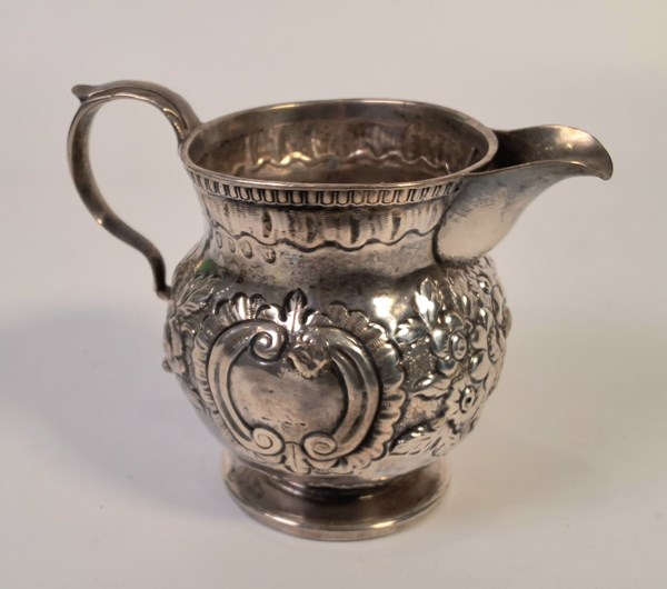 Lot 1033 - SILVER JUG