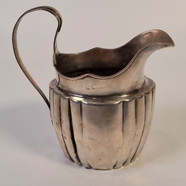 Lot 1024 - SILVER JUG