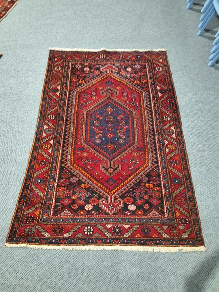 Lot 247 - PERSIAN WOOLLEN RUG