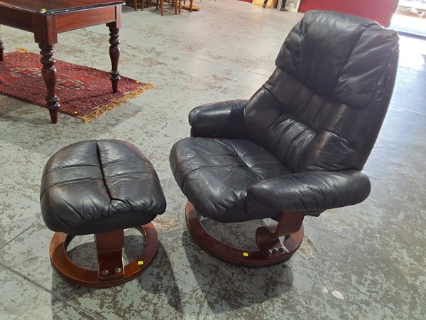 Lot 39 - RECLINER AND STOOL