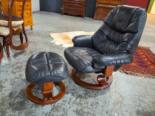 Lot 115 - RECLINER AND STOOL