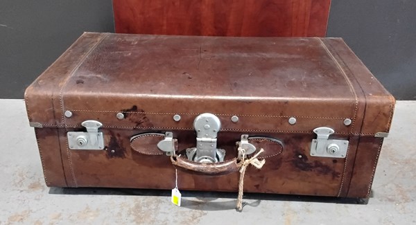 Lot 396 - LEATHER SUITCASE