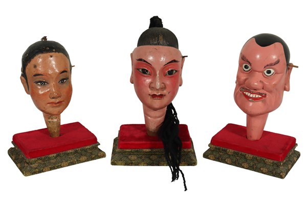 Lot 54 - THREE CHINESE PUPPET HEADS