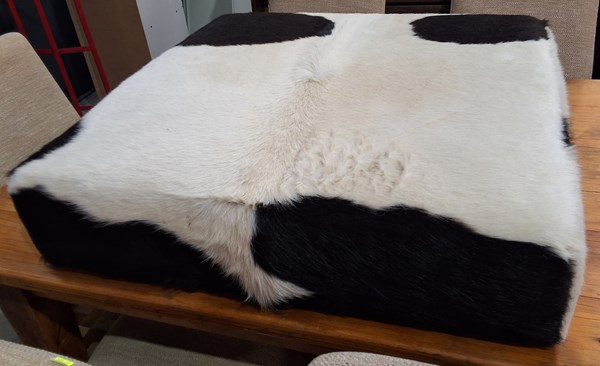 Lot 505 - COWHIDE OTTOMAN