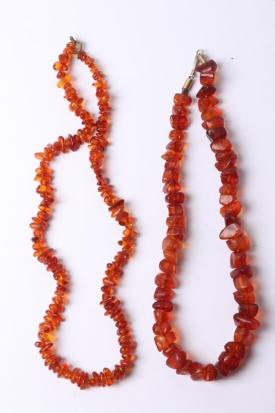 Lot 1038 - AMBER NECKLACES