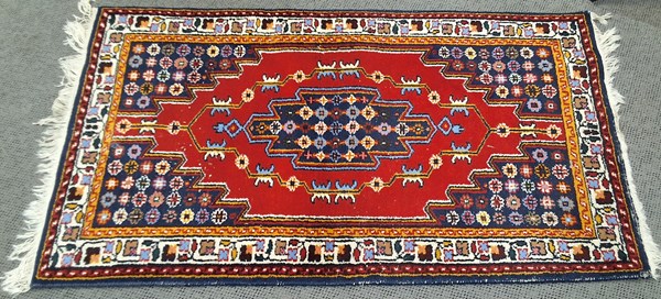 Lot 214 - PERSIAN RUG