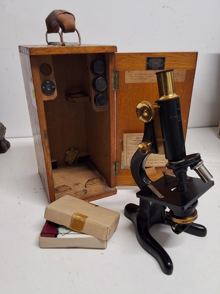 Lot 1168 - TIMBER CASED MICROSCOPE