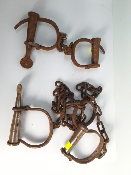 Lot 1399 - IRON HANDCUFFS & SHACKLES